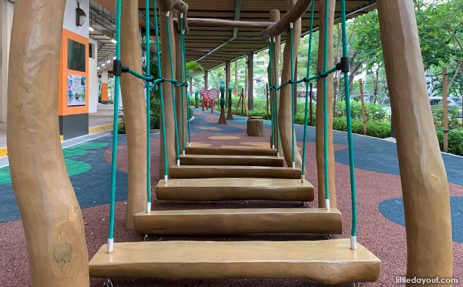 Low wooden plank bridge at The Candy Trail, Clementi