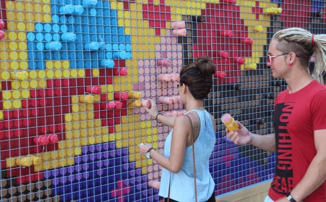 Inserting scrolls at for the Singapore's Largest Mural of Scrolls