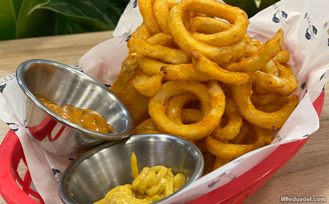 Curly Fries and a special curry aioli dipping sauce.