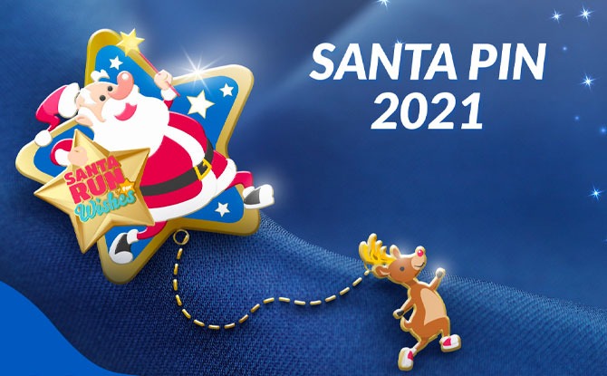 Santa pin, accompanied by a reindeer pin