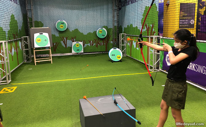 Taking Aim At the Archery Station At SuperPark Singapore