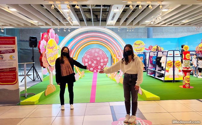 Holding a lollipop at Changi Airport