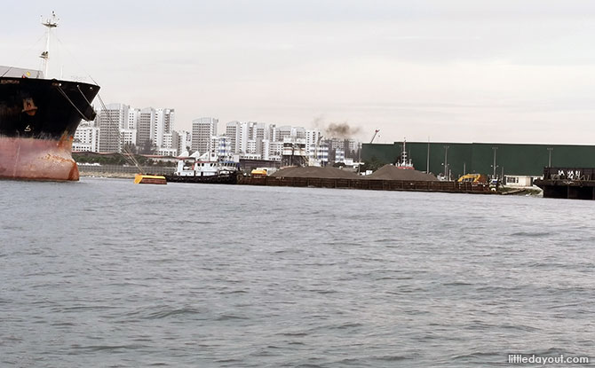 huge sand storage and the barges containing sand