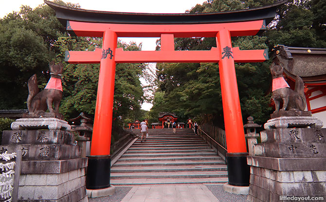 Foxes at the Torri Gate of Fushimi Inari Shrine