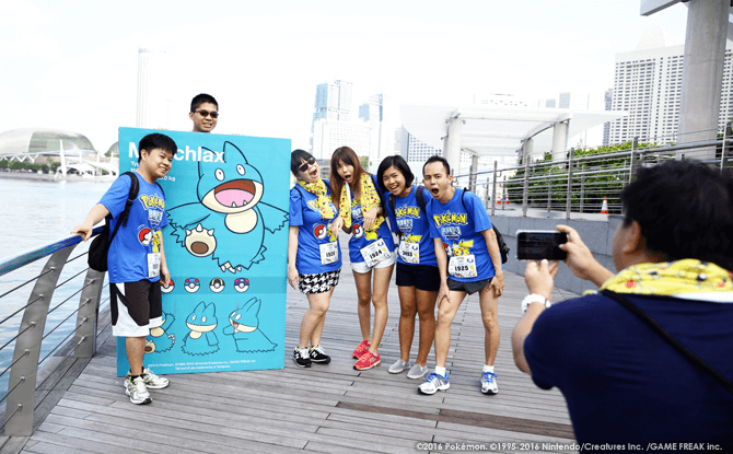 Participants snapping photos along the Pokémon Run route.