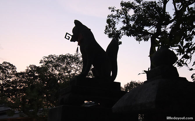 Fox Holding the Key Foxes at Fushimi Inari Shrine