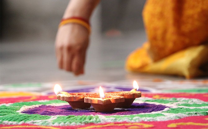 kolam - intricate patterns made from coloured rice powder or rice grains