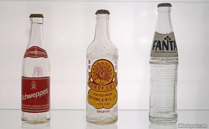 Old bottles at the Food Packaging exhibition, National Museum of Singapore