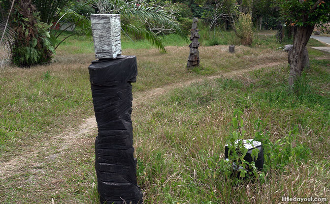 stacked Wooden Sculptures In Pasir Ris Park