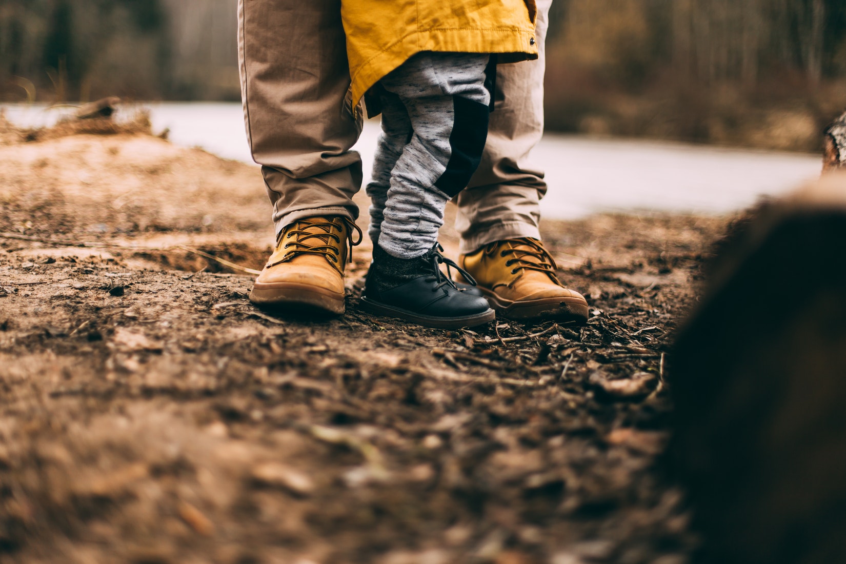 Father and child standing together 