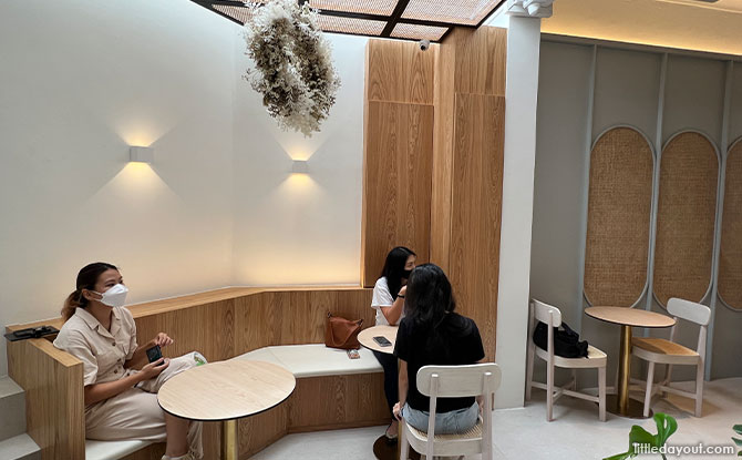 lounge area with a perforated rattan ceiling