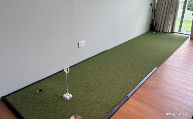 15th Club Golf Studio: An Indoors Golfing Destination For Families 5 little strip of green near the seating area