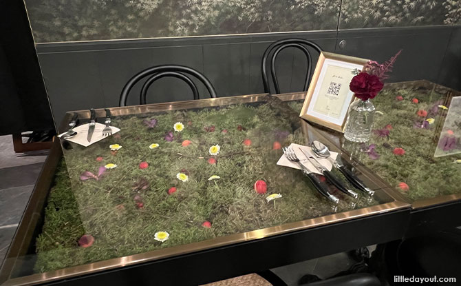 live flower bed on each table