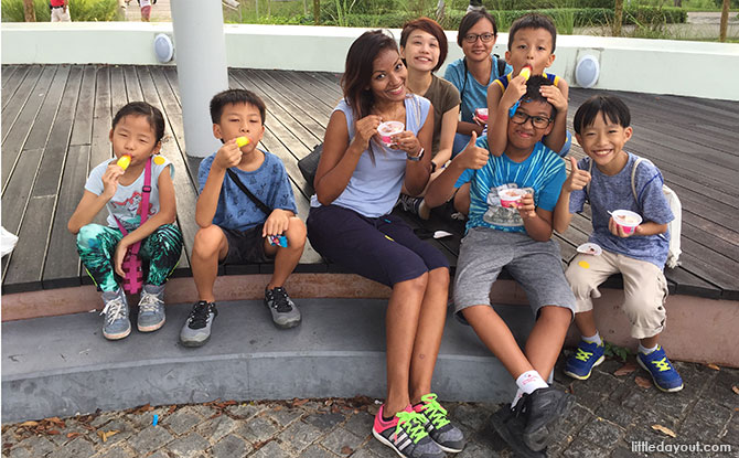 Happy faces after the race, cooling down with an ice cream treat.