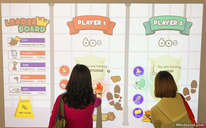Virtual toilet mop-up challenge at Know Your Poo exhibition, Science Centre Singapore