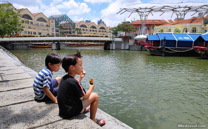 Sitting by the Singapore River