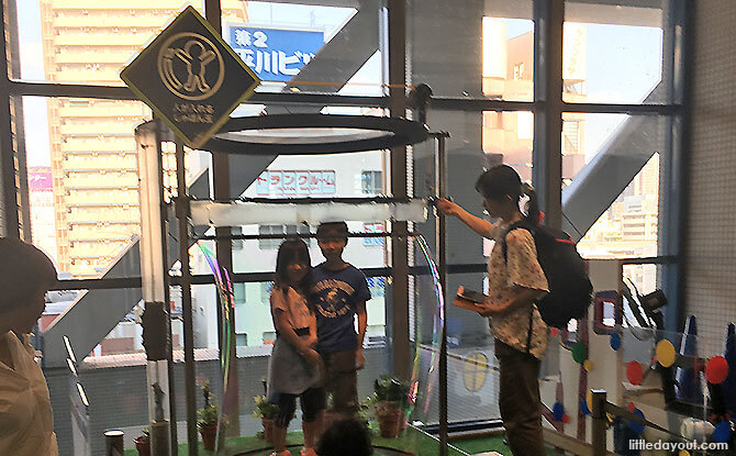 Kids Plaza Osaka: Play, Learn And Discover In Japan 6 Stand inside a bubble at Kids Plaza Osaka