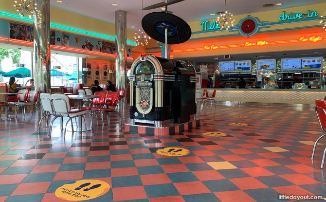 Tables are spaced out at Mel's Drive-In