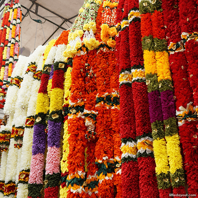 Colourful garlands line the walkway.