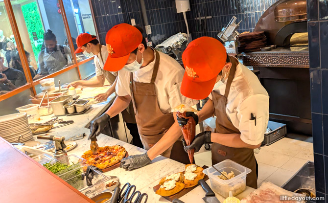 watching the chefs craft their fare