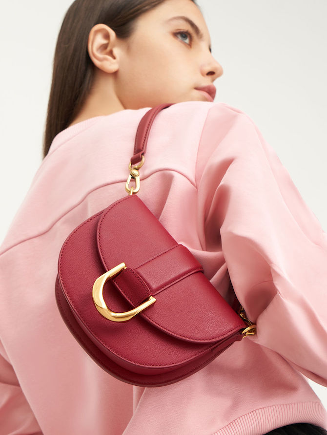 Charles & Keith Mini Gabine Leather Saddle Bag in Red