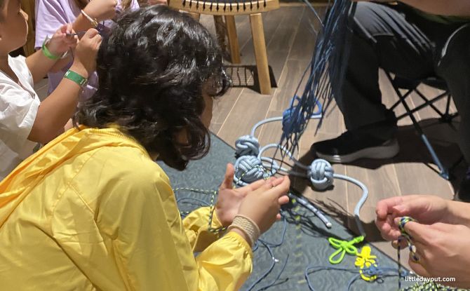 Crocodile Lodge At Rainforest Wild Adventure: A Different Kind of Staycation 9 Knot tying adds a hands-on outdoor skill element that fits naturally into the camping-inspired theme, especially for younger children experiencing it for the first time.