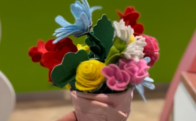 The florist shop is stocked with soft felt flowers and paper wraps for bouquet-making.