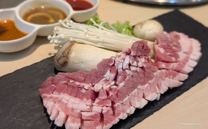Seorae Jib: Korean Charcoal BBQ With 100 Knife Cuts Samgyeobsal 1 SEORAE JIB: Pile on the meat, turn up the heat