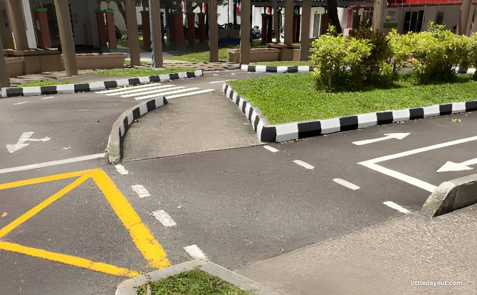 Tampines Street 21 Mini Road Safety Park: Asphalt Course With Yellow Box 3 Yellow box at the Road Safety Park in Tampines