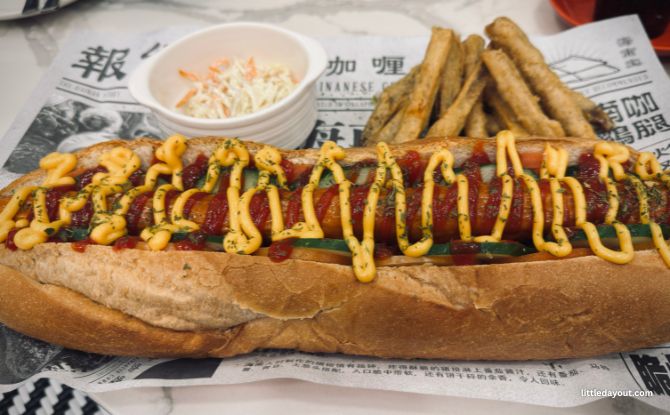 The Hainan Story Chapter Two At Jewel Changi: More Than Chicken Rice 7 Monster Kongzilla, a giant 40cm cheesy chicken sausage on a grilled baguette drizzled with nacho cheese and tomato sauce