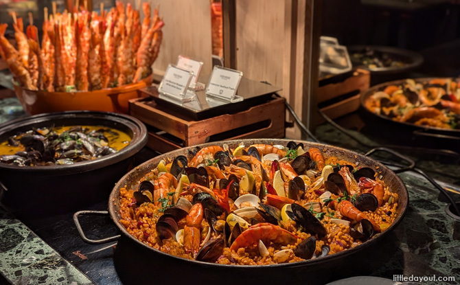 Parmigiano Cheese Wheel Carbonara Pasta and Valencian Seafood Paella