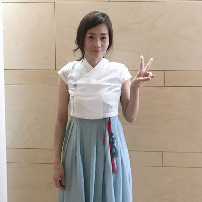 Lee Jee Eun, General Manager of the Korea Tourism Organization Singapore, who is wearing a modern hanbok.