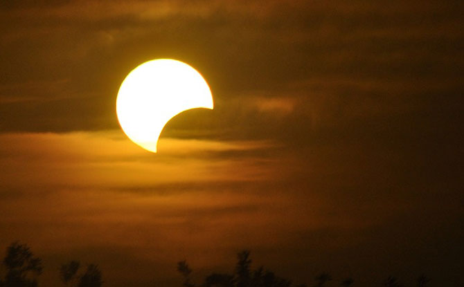 How often do solar eclipses happen?