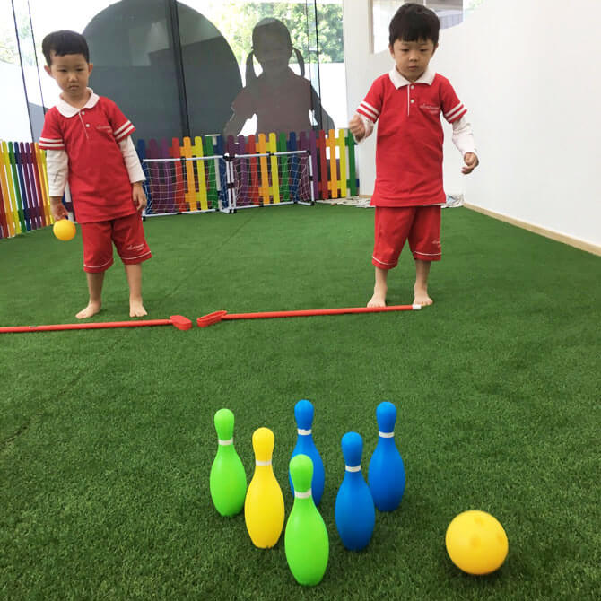 Preschoolers at MindChamps Boon Keng (Kallang) bowling