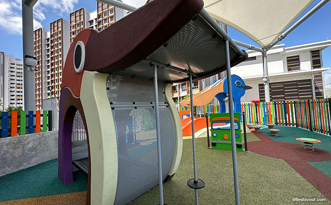 Bartley GreenRise Playground: Cherry Trees & Birds 7 orange, brown and purple bird play structure