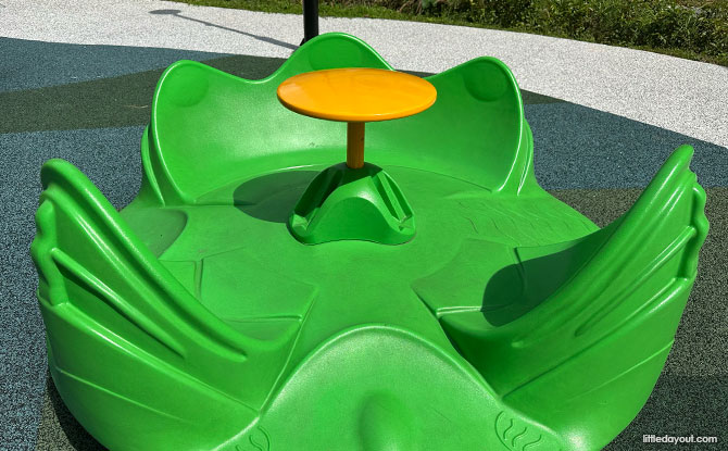 Canberra Vista Playground: Roller Slides & Fun On The Slopes 8 tub merry-go-round