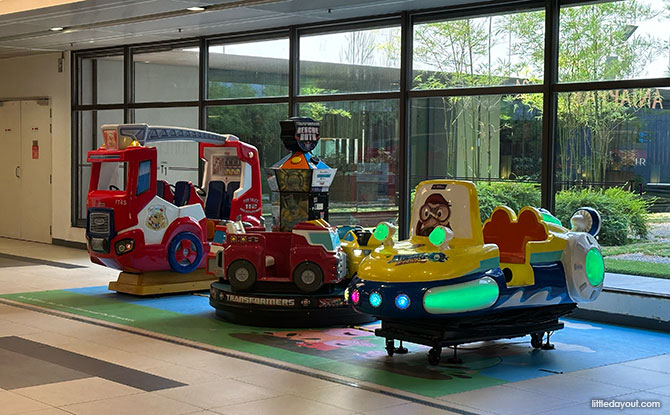 Changi Airport Terminal 1: Food, Shops & Attractions 17 coin-operated rides next to Burger King