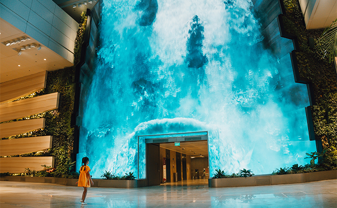Changi Airport Terminal 2 Reopens With A 14-Metre-Tall Digital Waterfall
