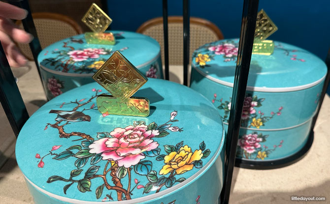 Cherki Restaurant: A Modern Take On Peranakan Food At Singapore Chinese Cultural Centre 3 blue tingkat sets