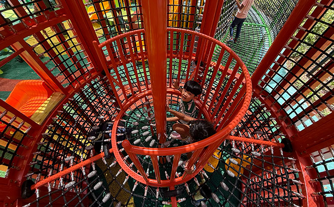 City Square Mall Playground: Community Play Space At City Green 3 red flower structure