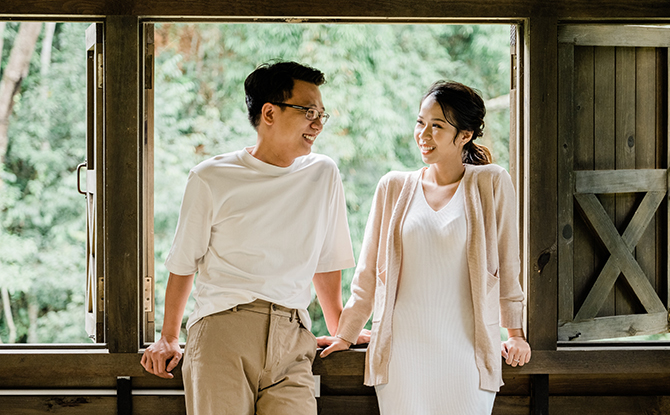 couple smiling at each other How to Talk to Your Partner About Money