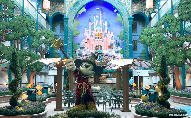 Disney Adventure Cruise Guide: 7 Themed Areas, Dining Spots, Fun Activities & Useful Tips 6 Sorcerer Mickey topiary