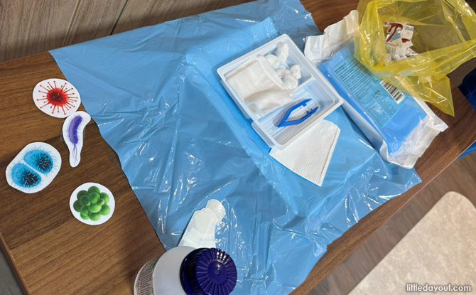 Doctor For A Day At Mount Elizabeth Hospital Review 8 dress each others’ “sticker wounds” with cotton swabs and plasters.