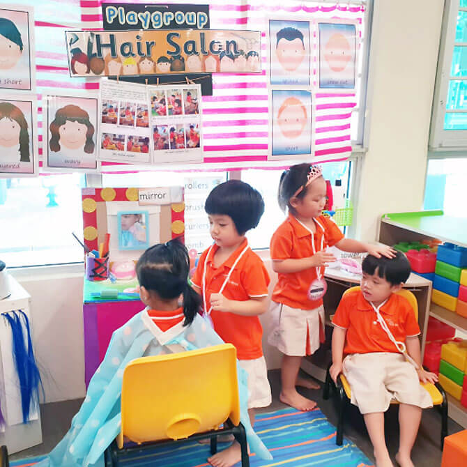 Getting their haircuts at a Hair Salon.