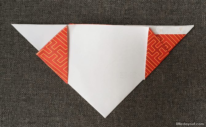 Crafting the dog origami from an angpow