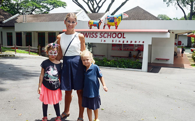 Countries Of The World: Switzerland Charlotte Clancy, from The Swiss School in Singapore, with her daughters