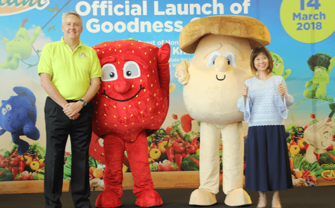 Dr Amy Khor and Mark Herbert with Giant Supermarket’s Goodness Gang Mascots