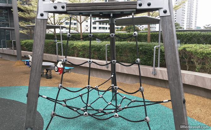 Wooden climbing tower at the rooftop playground at The Seletar Mall