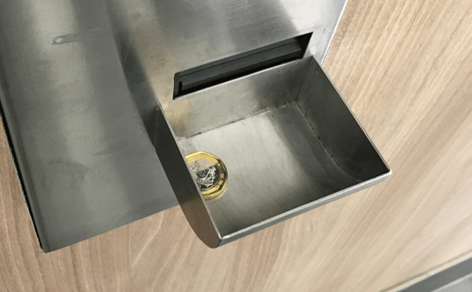 Coin return tray