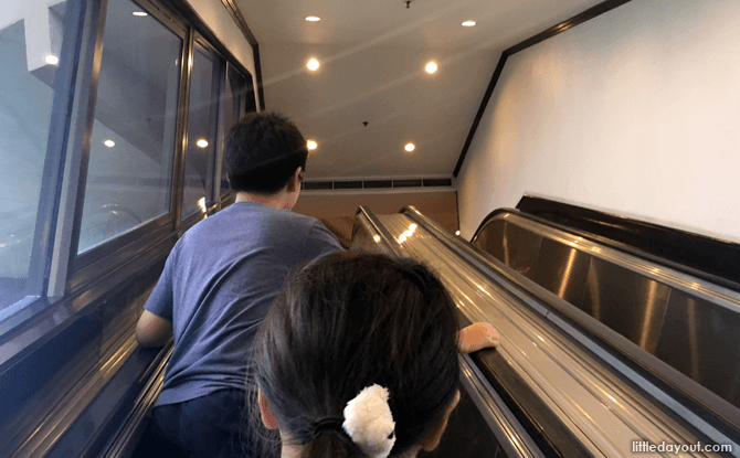 Escalator leading up to the restaurant